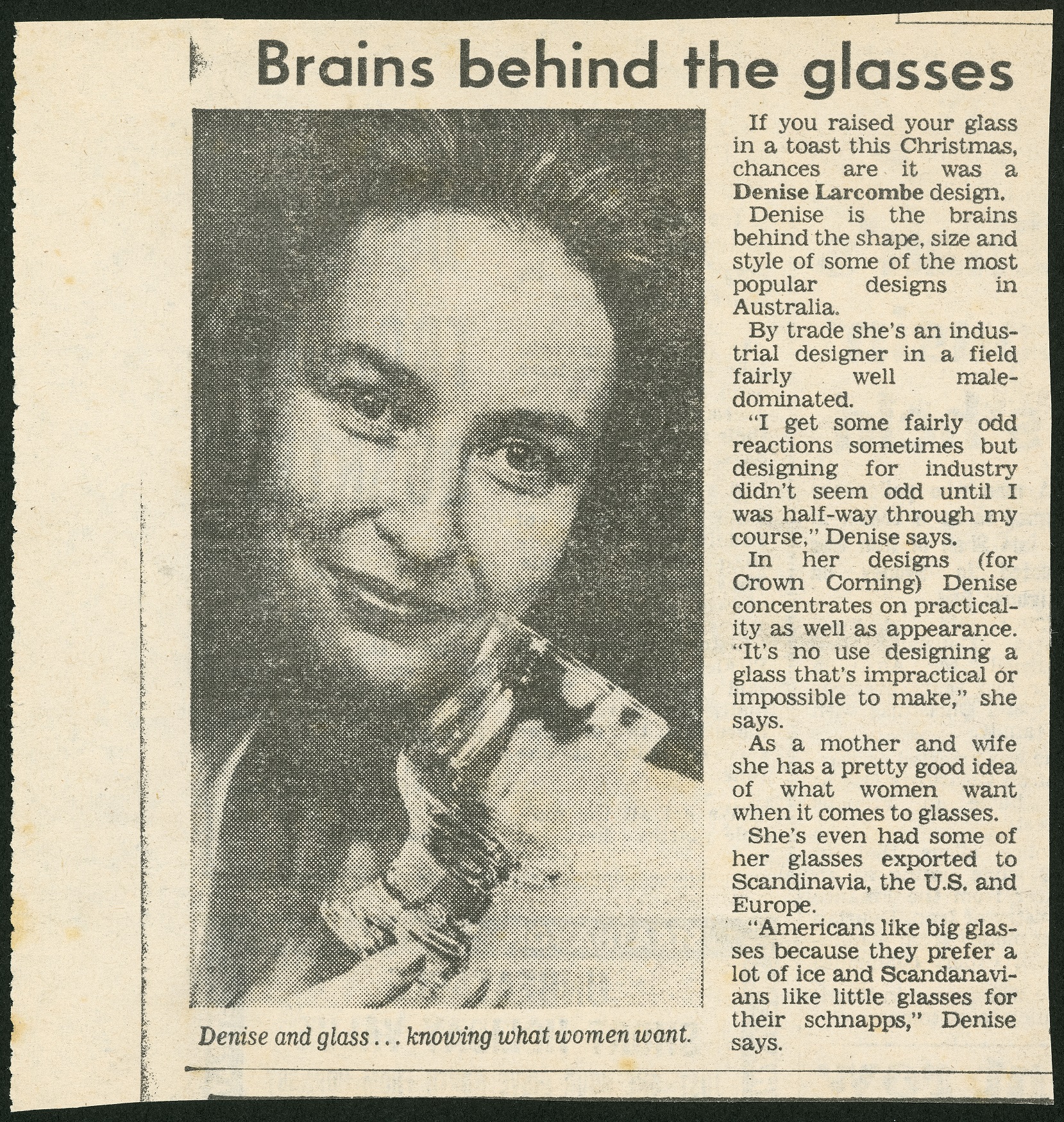 Newspaper article with a photograph of a woman and the title 'Brains behind the glass'.